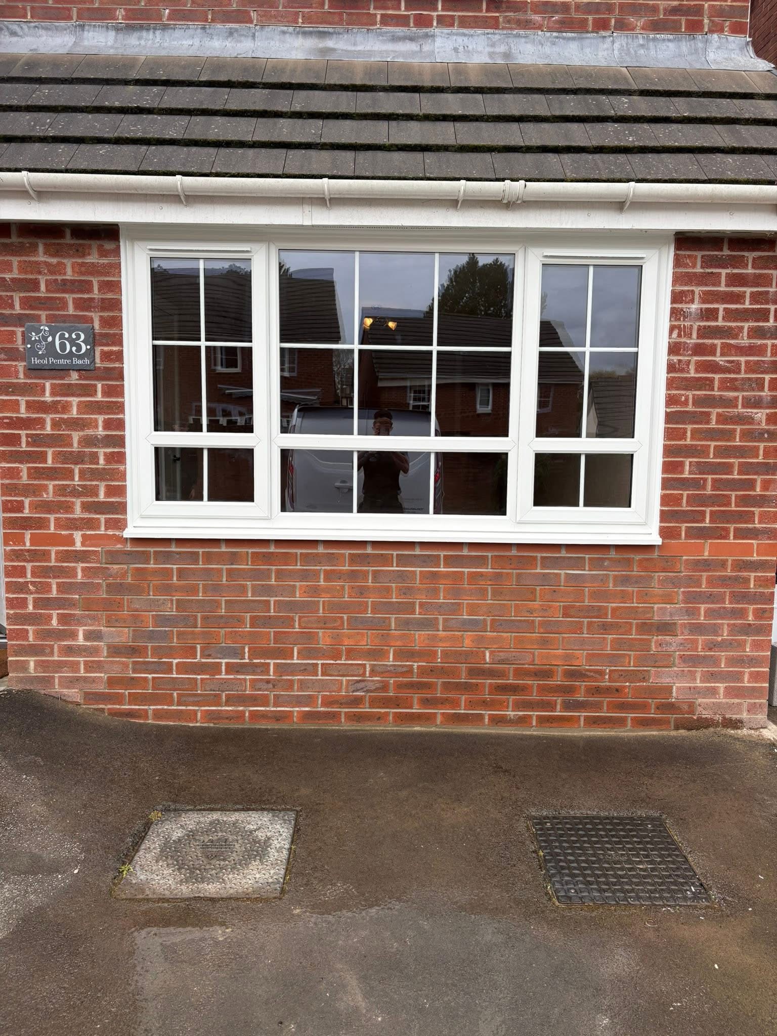 White window fitted into the converted garage